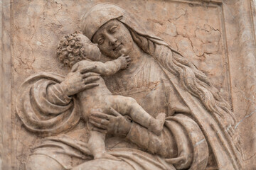 old marbel relief of holy mary and jesus christ 