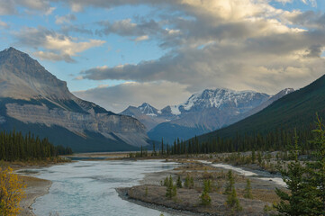 Fototapeta na wymiar Glacial River and Mountains in the Rockies