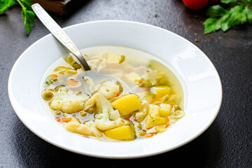 vegetable soup pasta first course broth, potatoe, cauliflower, carrot no meat vegetarian or vegan portion on the table meal snack top view copy space for text food background