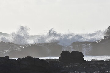 Watching the waves from the cliff