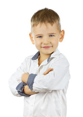 Handsome little boy in white shirt standing with crossed arms