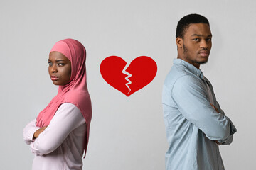 Disappointed black man and woman with broken heart