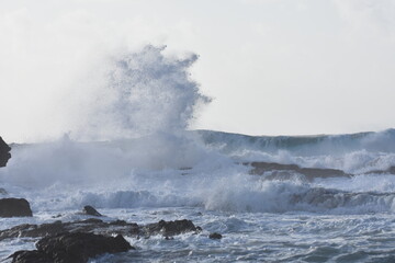 Watching the waves from the cliff