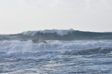 Fototapeta premium Watching the waves from the cliff