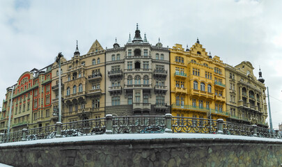 Naklejka premium Beautiful colorful historical buildings on Masaryk embankment in Prague city center, Czech Republic 