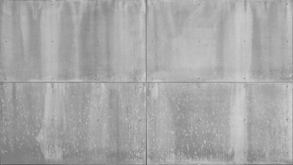 Anthracite gray grey grunge wall with rivets, fiberglass concrete skin cement facade panels texture...