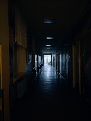 dark scary corridor and light at the end
