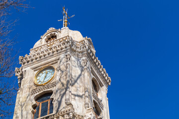 Fototapeta premium The clock tower in front of Yildiz Hamidiye Mosque.