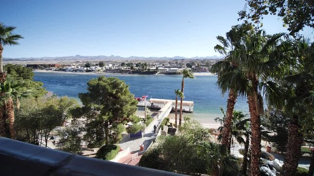 Laughlin, Nevada USA, Colorado River Waterfront on Sunny Day, Slow Motion Hotel Terrace View