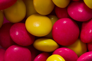 Colourful close up of sweets and candy. Coloured chocolate for desert