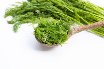 Fresh green dill on white.