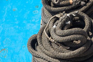 Coiled rope for mooring. Cyclades Archipelago, Greece.
