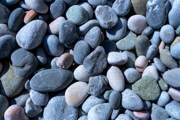 Oval sea-cut stones (pebbles) of different sizes create a natural texture