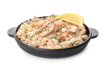 Frying pan with tasty risotto on white background