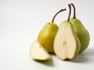 Green pear with a leaf isolated on white. Pear Clipping Path. Professional studio photo