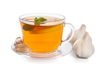 Cup of healthy garlic tea on white background