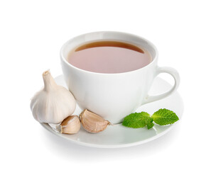 Cup of healthy garlic tea on white background