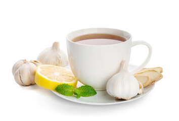 Cup of healthy garlic tea on white background