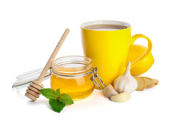 Cup of healthy garlic tea on white background