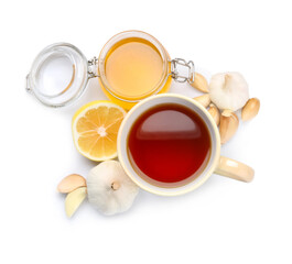 Cup of healthy garlic tea on white background