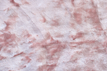 Beige luxury velvet fabric. Rose gold pink velvet background or velor flannel cotton or wool texture with soft fluffy velvety satin fabric metallic color material