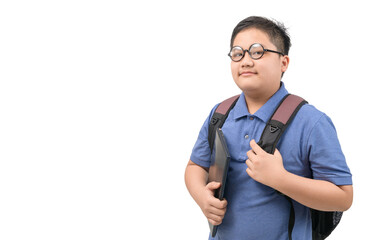 Handsome boy student carrying a school bag and laptop isolated