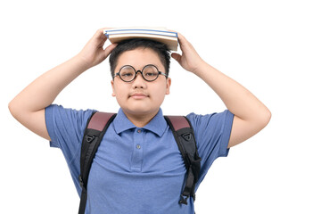 smart asian obese boy wearing glasses and hold a piles of books over his head