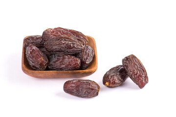 HURMA, Dates. Dried dates fruit with wooden plate on white background. Popular fruit of Ramadan. .