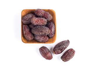 HURMA, Dates. Dried dates fruit with wooden plate on white background. Popular fruit of Ramadan. .