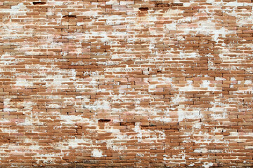 Old brick wall in vintage and retro texture background.