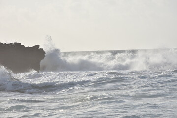 Watching the waves from the cliff