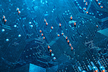 Electronic blue circuit board, computer microcircuit top view, selective focus. The concept of...