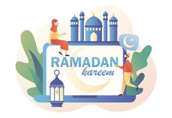 Naklejka premium Ramadan Kareem - text on laptop screen. Holy Month, lantern for pray at night and mosque. Tiny people greet each other Eid mubarak holiday. Muslim Feast. Modern flat cartoon style. Vector illustration