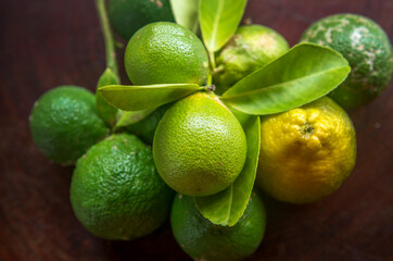 Fresh green eco Lime fruits with green leaf.