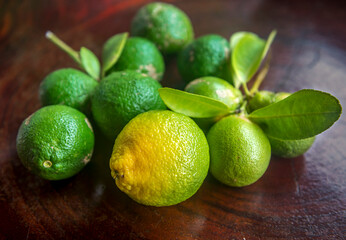 Fresh green eco Lime fruits with green leaf.