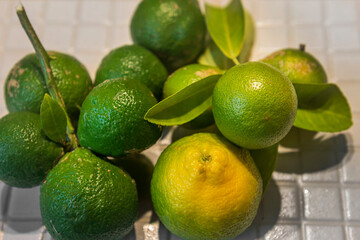 Fresh green eco Lime fruits with green leaf.