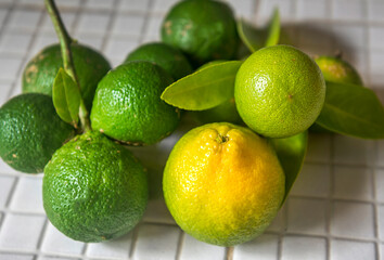 Fresh green eco Lime fruits with green leaf.