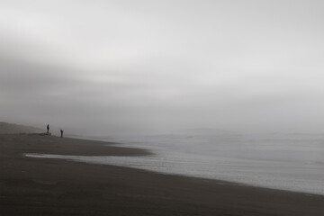 Fototapeta na wymiar 2 people on the minimalist beach