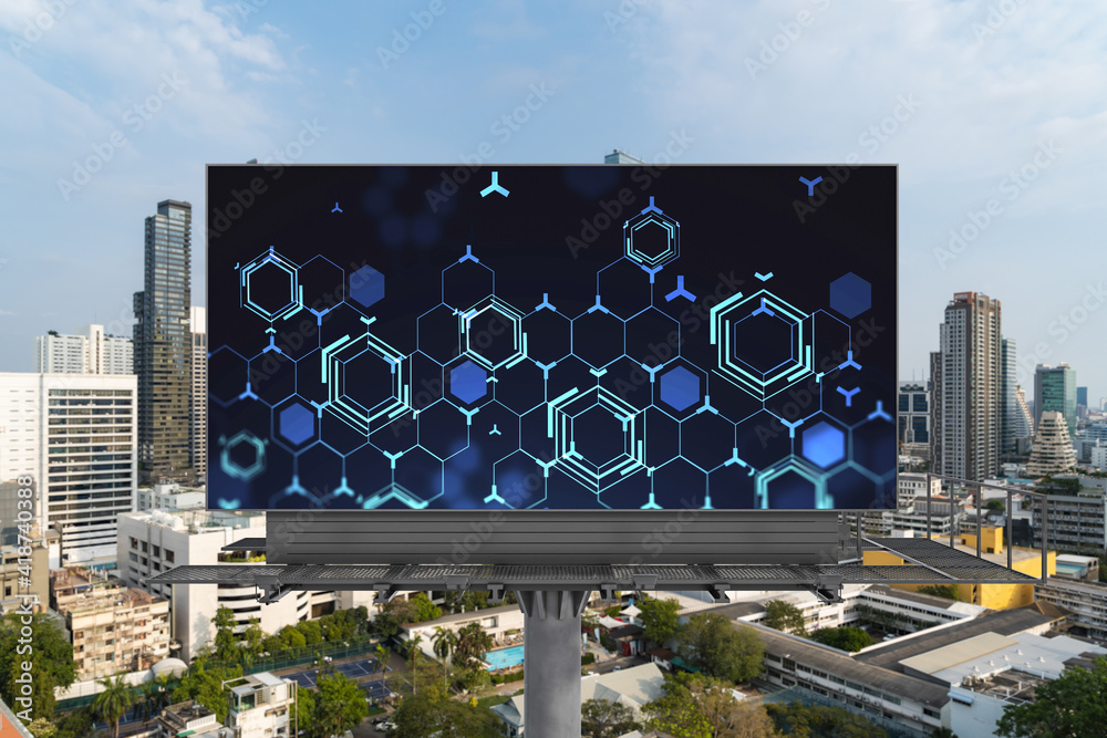 Wall mural technology hologram on billboard over panorama city view of bangkok. the largest tech hub in southea