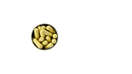 close-up of rutin capsules. dietary concept: iron container full of rutin capsules, on white background. dietary supplement isolated