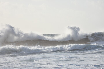 Watching the waves from the cliff
