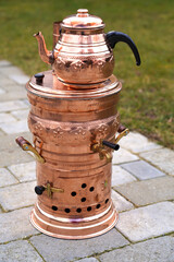 Turkish style copper samovar ( tea pot) works with firewood .    