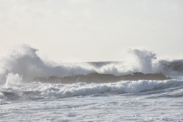 Fototapeta premium Watching the waves from the cliff