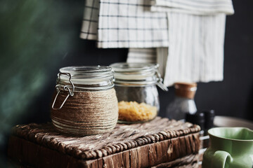 glass jar with pasta on a wicker table