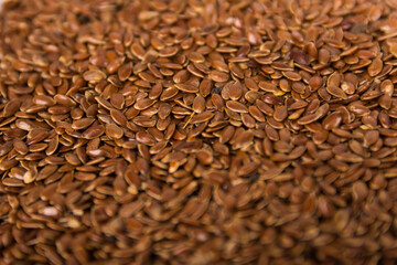 pile of Flax seeds close up top view