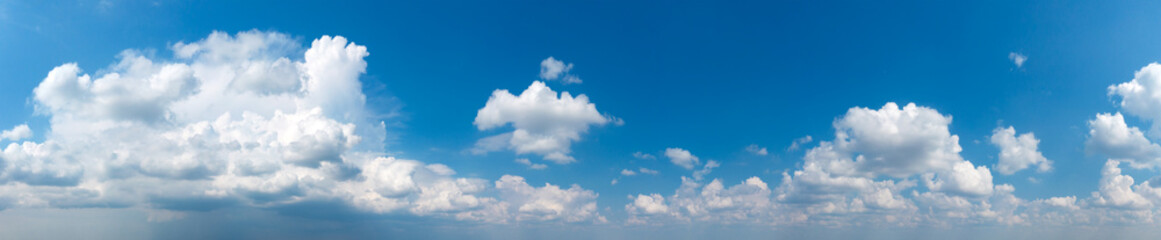 Panoramic fluffy cloud in the blue sky. Sky with cloud on a sunny day.