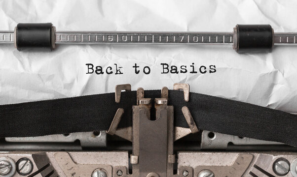 Text Back to Basics typed on retro typewriter