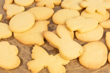 assortment of easter and spring cookies on parchment