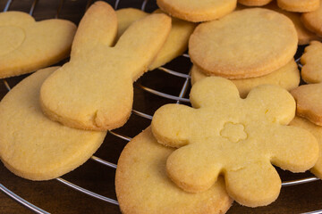 assortment of easter and spring cookies on a cooling rack