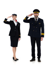 Obraz premium Pilot and flight attendant standing and saluting isolated on white background
